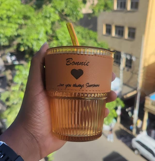 Customized tumbler with leather